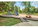 Holt Street Park featuring a fun playground with slides and climbing structures for children at 605 W Holt St, Mebane, NC 27302