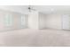 Bonus room features carpet flooring and a ceiling fan with light at 619 Baybush Dr, Raleigh, NC 27615