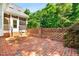 Enjoy this brick patio with brick pillars in a decorative pattern at 619 Baybush Dr, Raleigh, NC 27615