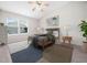 Bright bedroom with a ceiling fan and large windows at 6228 Saybrooke Dr, Raleigh, NC 27604