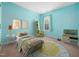 Charming ' bedroom featuring bright blue walls, playful décor, and a cute play area at 6228 Saybrooke Dr, Raleigh, NC 27604