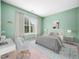 Serene bedroom offers a comfortable bed, soft lighting, and calming décor for relaxation at 6228 Saybrooke Dr, Raleigh, NC 27604