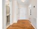 Inviting entryway with hardwood floors leads to the living area, adjacent to a convenient half bathroom at 6228 Saybrooke Dr, Raleigh, NC 27604