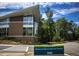 The Buffalo Road Aquatic Center features modern architecture with large windows and well maintained landscaping at 6228 Saybrooke Dr, Raleigh, NC 27604