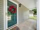 Inviting front porch with a decorative wreath on the door, offering a welcoming entrance to the home at 6228 Saybrooke Dr, Raleigh, NC 27604