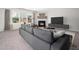 Cozy living room with fireplace, neutral tones, and large windows for natural light at 6228 Saybrooke Dr, Raleigh, NC 27604