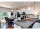 Spacious kitchen with granite countertops, stainless appliances, an island, and plenty of cabinet space at 7809 Lillyhurst Dr, Raleigh, NC 27612