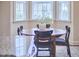 Charming breakfast nook features bay windows and cozy seating, perfect for morning gatherings at 808 Historian St, Raleigh, NC 27603