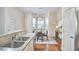 Cozy breakfast nook with a dining table, many windows, and modern lighting at 808 Historian St, Raleigh, NC 27603