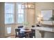 Inviting breakfast area with natural light, cozy decor, and charming lighting at 808 Historian St, Raleigh, NC 27603
