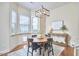 Bright breakfast nook with updated lighting, bay windows, and comfortable seating at 808 Historian St, Raleigh, NC 27603