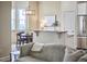 Open concept view of the kitchen featuring stainless steel appliances and granite countertops at 808 Historian St, Raleigh, NC 27603