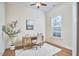 Cozy office space featuring hardwood floors, a window, and a modern desk at 808 Historian St, Raleigh, NC 27603