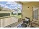 Relaxing screened patio with comfortable seating, perfect for enjoying the outdoors at 808 Historian St, Raleigh, NC 27603