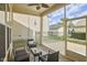 Inviting screened patio with comfortable seating, ideal for outdoor relaxation and entertainment at 808 Historian St, Raleigh, NC 27603