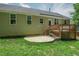 Backyard view of a home featuring a deck and patio area, perfect for outdoor living at 90 Weatherly Dr, Franklinton, NC 27525