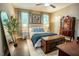 Cozy bedroom featuring a comfortable bed, natural light, and stylish decor at 90 Weatherly Dr, Franklinton, NC 27525