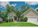 Charming single-Gathering home featuring a manicured lawn, tasteful landscaping, and a welcoming front porch at 90 Weatherly Dr, Franklinton, NC 27525