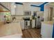 Well-lit kitchen with stainless steel appliances and ample counter space at 90 Weatherly Dr, Franklinton, NC 27525