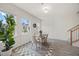 Inviting dining area with natural light and modern decor next to the staircase at 907 Lake Beacon Way, Raleigh, NC 27606