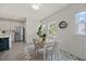 Charming dining area featuring an island, stainless steel appliances, and stylish chairs at 907 Lake Beacon Way, Raleigh, NC 27606