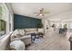 Open-concept living room flows into a modern kitchen, complete with a dining area at 907 Lake Beacon Way, Raleigh, NC 27606