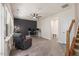 A welcoming living room with hardwood floors, a ceiling fan, and a designated office area at 907 Lake Beacon Way, Raleigh, NC 27606