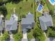 Aerial view of a home with a pool, patio, and manicured lawn at 9220 Cornwell Dr, Wake Forest, NC 27587