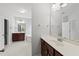 Bright bathroom features a double vanity, soaking tub, and separate shower, creating a spa-like experience at 9220 Cornwell Dr, Wake Forest, NC 27587