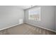 Cozy bedroom with carpet, a window bringing in natural light and closet space at 9220 Cornwell Dr, Wake Forest, NC 27587
