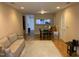 Cozy living room featuring wood floors, neutral walls, and comfortable seating for relaxing and entertaining at 929 Morreene Rd # C-14, Durham, NC 27705