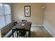 Inviting dining room with modern table and chairs, perfect for entertaining at 929 Morreene Rd # D-34, Durham, NC 27705