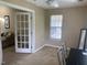 Cozy office with natural light, ideal for a productive workspace at 929 Morreene Rd # D-34, Durham, NC 27705