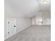 Versatile carpeted bonus room with unique architectural details and ample storage at 9427 Turkey Way, Middlesex, NC 27557