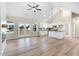 Spacious living room featuring an open-concept kitchen with modern appliances and plenty of natural light at 9427 Turkey Way, Middlesex, NC 27557