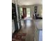 Bright entryway with hardwood floors, leading to a spacious living area and kitchen at 956 W Greensboro Chapel Hill Rd, Snow Camp, NC 27349