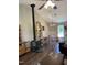 Comfortable living room with a wood-burning stove, adjacent to the dining and kitchen areas at 956 W Greensboro Chapel Hill Rd, Snow Camp, NC 27349