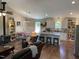 Spacious open-concept living area with a kitchen, dining space, and comfortable seating at 956 W Greensboro Chapel Hill Rd, Snow Camp, NC 27349