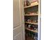 Spacious pantry with ample shelving, perfect for organized storage of food items and household supplies at 956 W Greensboro Chapel Hill Rd, Snow Camp, NC 27349