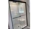 Modern shower stall with glass enclosure and built-in seat, offering a spa-like experience in your own home at 956 W Greensboro Chapel Hill Rd, Snow Camp, NC 27349