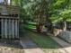 Green, tree-lined path between buildings at 979 St Marys St # G6, Raleigh, NC 27605