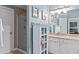 Bright bathroom featuring a glass enclosed shower and vanity storage at 1008 Old Meetinghouse Way, Raleigh, NC 27615