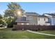 Backyard view showcasing the home's exterior, fencing, and landscaping at 1009 Porchside Dr, Apex, NC 27502