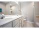 Spacious bathroom featuring a dual vanity, updated fixtures, and separate tub and shower at 1009 Porchside Dr, Apex, NC 27502