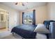 Bedroom with a window view, neutral walls, and comfortable decor at 1009 Porchside Dr, Apex, NC 27502