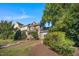 Charming townhome featuring well-maintained landscaping and inviting front porch at 1009 Porchside Dr, Apex, NC 27502