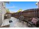 Private outdoor space featuring a patio, wooden bench, and fenced area at 1009 Porchside Dr, Apex, NC 27502