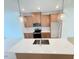 Modern kitchen features stainless steel appliances, stone countertops and a spacious center island at 1015 Regalia Rd # 27, Durham, NC 27713