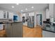 Open kitchen featuring stainless steel appliances and granite countertops at 102 Alidade Ct, Cary, NC 27513