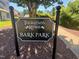 Thompson Ridge Bark Park sign showcases pet-friendly community amenities for outdoor fun and relaxation at 112 Salmon River Dr, Durham, NC 27705